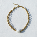 Sloane Pearl Chain – Three-Row Interlocked Links on White Linen